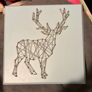 HANDMADE baby blue and light grey string reindeer wall art.